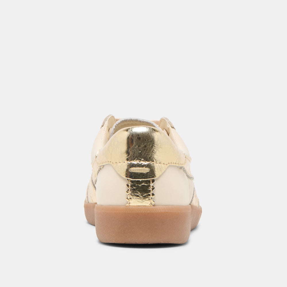 Merit White Gold Leather Sneakers | Dolce Vita Women