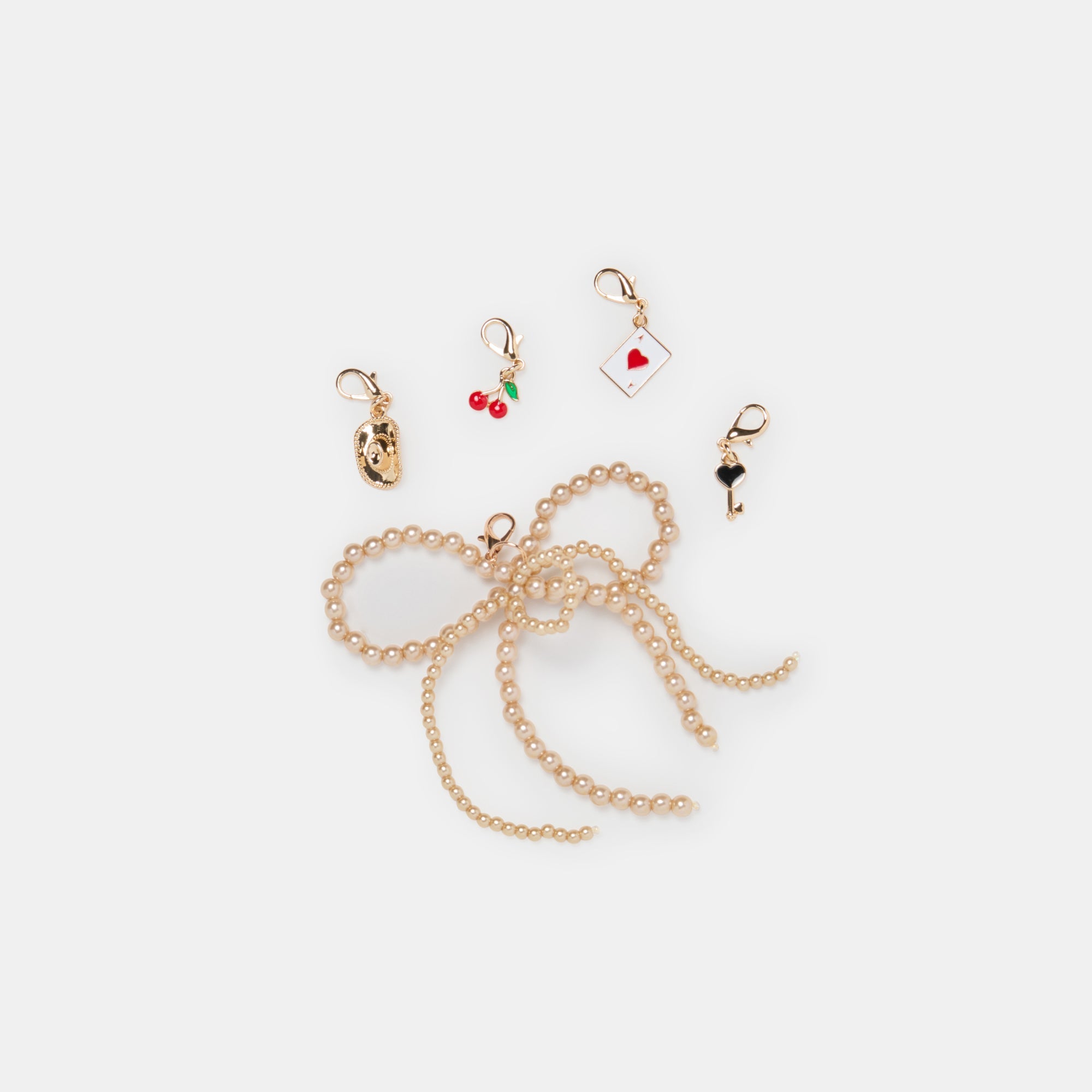 GOLD BOW CHARM PACKAGE ASSORTED | Women Dolce Vita