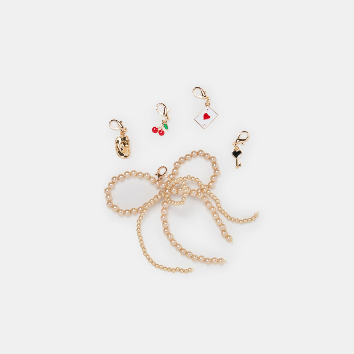 GOLD BOW CHARM PACKAGE ASSORTED | Women Dolce Vita